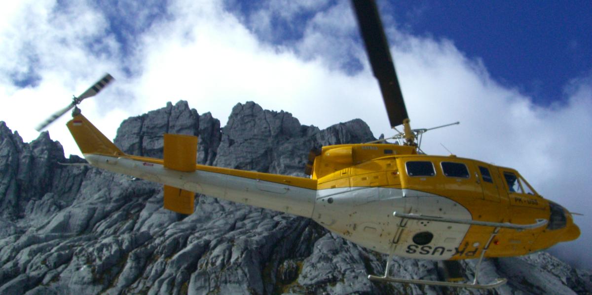 Climb Carstensz Using Private Chartered Helicopter